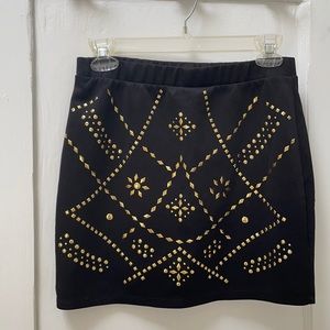 Black miniskirt w/ gold embellishment